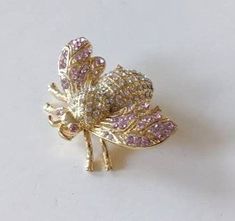 This beautiful vintage, insect pin or brooch, features rhinestones on a gold tone body. This looks like a bumble bee. It is in great condition and measures approximately 1 1/4" x 1 1/2". Great gift for insect brooch collectors! Want to see more beautiful vintage jewelry? http://www.etsy.com/shop/jewelryandthings2?section_id=10890684 Entire items in my shop: http://www.etsy.com/shop/jewelryandthings2 Bumble Bee Insect, Bumble Bee Costume, Insect Brooch, Bee Costume, Jewelry Brooch, Toned Body, Bumble Bee, Vintage Gold, Costume Jewelry