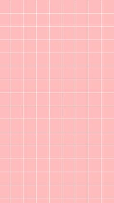 a pink tiled wall with small squares in the middle and one square at the top