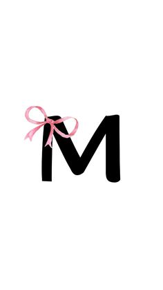 the letter m has a pink bow on it's head and is black with a light pink ribbon