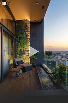 a balcony with a couch and water feature on it's side, overlooking the city