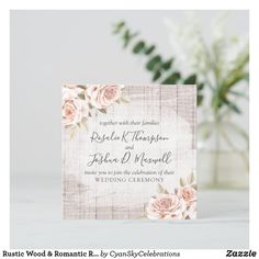 a wedding card with pink roses on it