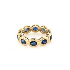 The Reese Eternity band features 10 stunning blue sapphires set in 14k yellow gold. Blue Sapphire symbolized truth, sincerity and loyalty. 14k yellow gold 3.28 grams Sapphire 3.31 Size 7 Stackable Sapphire Ring In Yellow Gold, Yellow Gold Sapphire Round Eternity Band, Yellow Gold Stackable Sapphire Ring, 14k Yellow Gold Eternity Band With Birthstone, Yellow Gold 14k Eternity Band With Birthstone, Timeless Stackable Yellow Gold Sapphire Ring, Yellow Gold Sapphire Halo Ring, Gold Sapphire Eternity Band With Prong Setting, Yellow Gold Sapphire Stackable Eternity Band