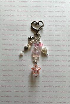 a keychain with charms attached to it