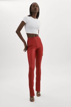 Your go-to leather pants get a sleek new update. Cut from supple stretch lamb leather with a second-skin fit, they feature a high waist and straight leg with a side split hem for an edgy flair. Wear with everything from casual t-shirts to bodysuits. Swim Accessories, Side Split, Split Hem, Ruby Red, Second Skin, Casual T Shirts, Skirt Pants, Dress Accessories, Dress Skirt