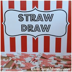 a red and white striped sign with straws in front of it that says straw draw