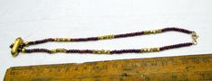 Vintage 22 K gold & Ruby gemstones beads strand necklace. Length-42 cm( we can adjust length), size of pendant-2.7/2 cm, weight- 16 grams, material- 22 K gold and rubies( pendant may have a bit of wax inside). Gold Kundan Necklace With Faceted Beads As Gift, Traditional Gold Bracelets With Faceted Beads, Gold Temple Jewelry Necklace With Faceted Beads, Traditional Gold Necklaces With Tiny Beads, Traditional Gold Necklace With Tiny Beads, Traditional Gold Single Strand Beads, Traditional Gold Kundan Necklace With Faceted Beads, Handmade Red Temple Necklace, Red Temple Necklace With Round Beads