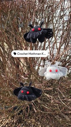 three crocheted bats hanging from a tree with red berries on their heads and the words pattern mothman c above them