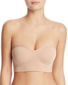 With lightweight padded cups and optional straps, Yummie's wireless bralette is as comfy as it is versatile. Hands For Bra, Chic Bandeau Bra With Built-in Support, Seamless Strapless Nursing Bra, Strapless Seamless Nursing Bra, Strapless Bra With Removable Pads For Spring, Spring Full Coverage Padded Bra, Spring Solid Bra With Removable Pads, Versatile Bra With Removable Pads, Versatile Stretch Bra With Removable Pads