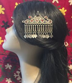 This lovely hair clip was once worn by females from the kuchi/kochi tribe. Girls wore them out to formal occasions while it was an essential accessory for a bride.  Measurements: 8cm  long 8cm  in width There might be some  flaws/inaccuracy present in these items (stones may not be present, different sizes in bead PLEASE DO NOT EXPECT PERFECTION IT IS ALL HANDMADE Traditional Headpieces For Festivals, Bohemian Festival Headband Headpieces, Bohemian Handmade Hair Accessories For Wedding, Handmade Bohemian Hair Accessories For Wedding, Handmade Bohemian Wedding Hair Accessories, Bohemian Festival Hair Accessories, Bohemian Multicolor Wedding Headpiece, Traditional Handmade Headband, Bohemian Multicolor Hair Accessories For Gifts