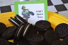 there is a plate with oreos and a sign that says luigi's spare tires