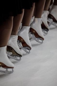 there are many pairs of ice skates lined up