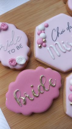 three decorated cookies with the words bride to be on them