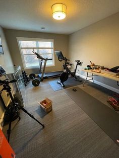 there is a room with exercise equipment in it