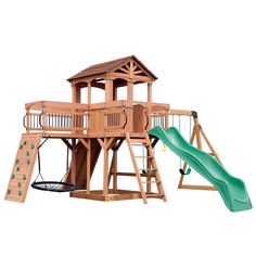 a wooden playset with a green slide and climbing frame on the bottom level, in front of a white background