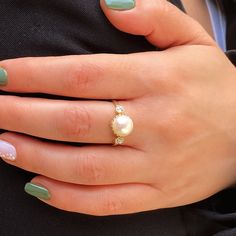 Pearl Engagement Gold ring, Solid 14k Gold ring. This handmade Gold ring with Pearl is made of 14K genuine gold and set with Natural Pearl. This Stunning Ring is set with Best AAA+ Quality Natural Pearl set in 14k Yellow Gold. High end finish. This 14k Gold ring can serve as an engagement ring or a birthday gift. All colors at the picture are available. * Gemstone -8mm Round Natural Pearl. * Metal - 14K genuine gold - White or Rose Gold are also available . * Ring - please select your size. * Be Elegant Gold Halo Ring With Gemstone, Exquisite 14k Gold Rings With Prong Setting, Silver 14k Gold Halo Ring, Dainty 14k Gold Cluster Ring With Halo Setting, Heirloom 14k Gold Halo Ring With Round Cut, Exquisite 14k Gold Ring With Center Stone, Classic Gold Halo Ring With Gemstone, Gold 14k Hallmarked Pearl Ring, Elegant 14k Gold Halo Ring With Gemstone