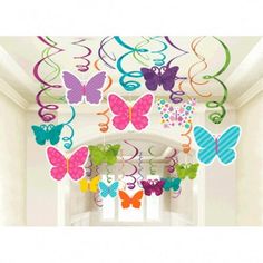 colorful butterfly decorations hanging from the ceiling