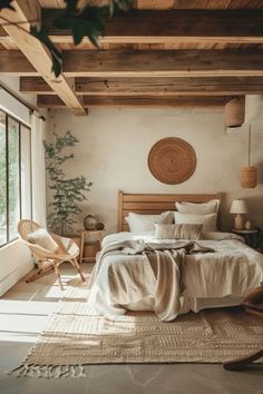 a bed sitting in a bedroom next to a window with lots of light on it