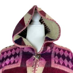 Discover the perfect blend of style and coziness with our women's and men's hooded alpaca poncho. Made from luxurious alpaca wool, this versatile garment is designed to keep you warm and fashionable. Shop now and elevate your winter wardrobe with our premium hooded alpaca poncho.- Very soft and warm- Large and long perfect for the coldest wintertime- Lightweight cape- Comfortable shawl- With fringes and geometric patterns - Made of alpaca wool and acrylicMeasurements: Length from shoulder to bot Cozy Long Sleeve Alpaca Poncho, Hooded Wool Poncho For Fall, Bohemian Hooded Alpaca Poncho, Bohemian Alpaca Hooded Outerwear, Bohemian Hooded Alpaca Outerwear, Open Poncho, Alpaca Poncho, Hooded Poncho, Mens Hooded