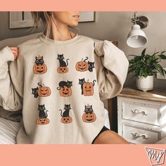 Get your trick or treat on with this super fun super spooky Halloween shirt! Cat lover Halloween gift for her special day!  ♥Adult Unisex Sweatshirt ♥ Super soft and Comfy 100% cotton  ♥This item runs a size large for women, consider sizing down.  ♥SIZING Please use sizing chart to understand the measurements.  WE DO NOT ACCEPT EXCHANGES, RETURNS OR CANCELLATIONS. ♥WASHING INSTRUCTIONS Machine wash warm, inside out, with like colors. Use only non-chlorine bleach. Tumble dry medium. Do not iron. Fall Crew Neck Sweater With Cat Design, Crew Neck Sweater With Cat Design For Fall, Spooky Cat Design Tops For Fall, Spooky Fall Tops With Cat Print, Spooky Cat Print Tops For Fall, Ugly Christmas Sweater Cat, Fall Cat, Cat Christmas Sweater, Cat And Pumpkin