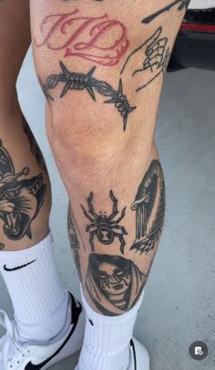 a man with many tattoos on his legs