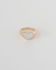 AN APSE CLASSIC INLAY SIGNET RING, LOVE EDITION. THIS DOMED SIGNET FEATURES A MOTHER OF PEARL HEART INLAY FRONT AND CENTER WITH A BB STAR SET DIAMOND SLIGHTLY HIDDEN ON THE SIDE. LOVE IS LIKE A TREASURE HIDDEN IN A FIELD, GIVE ALL YOU CAN TO FIND IT FOR YOURSELF. *READY-TO-SHIP SIZES INCLUDE:14K VERMEIL | 6.5, 7.5, 8.5STERLING SILVER | 7.5, 9 WILL SHIP WITHIN 1-BUSINESS DAY (& WE SUGGEST PRIORITY SHIPPING FOR GUARANTEED VALENTINE'S ARRIVAL) PRODUCT DETAILS HEART MOTHER OF PEARL INLAY RING1.75 MM White 14k Gold Heart Ring For Promise, White 14k Gold Signet Ring For Promise, White 14k Gold Signet Promise Ring, Classic White Heart Promise Ring, White Heart Ring For Promise, White 14k Gold Heart Ring As Gift, White 14k Gold Heart-shaped Ring, 14k Gold Heart-shaped White Rings, White 14k Gold Heart Cut Heart Ring