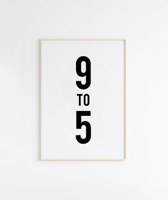 a black and white poster with the number nine to five printed on it's wall