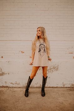 Fun Concert Outfits Country, Western Outfits Women Graphic Tee, T Shirt Dress And Boots, Western Graphic Tee Dress, Cute Cowgirl Outfits Concert, Western Shirt Dress Outfit, Tan Western Boots Outfit, Edgy Country Concert Outfit, Cute Cowgirl Outfits Party