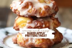 two glazed apple fritters stacked on top of each other