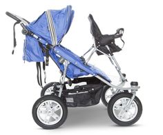 a baby stroller with a blue cover on it's back and seat in the middle