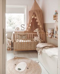 a baby's room is decorated in neutral colors