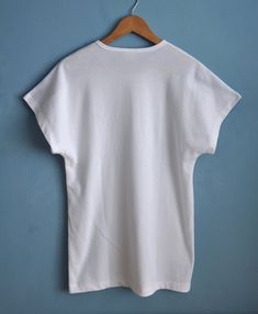 Vintage white and baby blue PUMA sports top, from the 1980s Summer 80s PUMA top with dolman short sleeves and long straight shape. The top features light blue terry cloth pieces on the shoulders, the rest is white! Has the brand's logo on the front Material - cotton and polyester, fabric is thick, not lightweight! Size - L Measurements (taken while top is lying flat, double armpit to armpit): Shoulders (undefined), measured from one sleeve's end to the other - 28.5 inches / 72.4 cm Armpit to Arm 90s Sports T-shirt For Summer, 90s Summer Sports T-shirt, Sporty White T-shirt With Puma Logo, Retro White Sports T-shirt, 80s Sports, Hipster Jeans, White Peasant Blouse, 90s Blue Sports T-shirt, Puma Sport