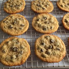 chocolate chip cookies cooling on a wire rack in the oven, ready to be eaten