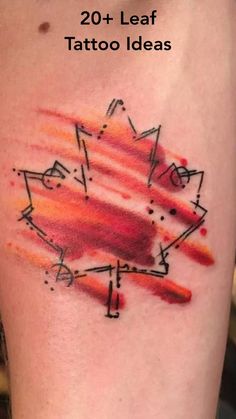 a tattoo design on the thigh with red and orange paint splattered over it