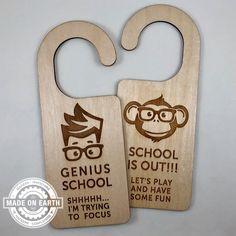 two wooden door hangers that say genius and school is out with monkeys on them