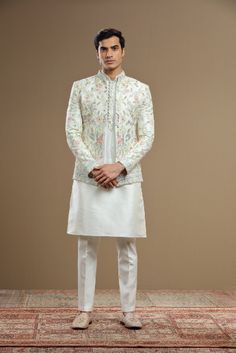 Hand embroidered cream short jacket with kurta, a perfect attire for a day wedding for the groomsmen. Shreeman offers a vast range of high-quality, traditional Indian ethnic wear online for men & women. Explore our premium wedding wear - Sherwani, Indo-Western, Bridal Lehenga, & more for all occasions. Worldwide Shipping! Indian Groomsmen Outfits, Brothers Outfits, Mens Indo Western, Kurta Pattern, Layered Kurta, Jodhpuri Suits, Jodhpuri Suits For Men, Wedding Dresses Men, Indo Western Outfits