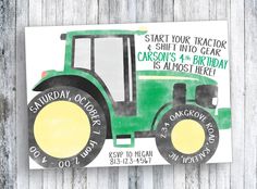 a green tractor birthday card on a wooden background