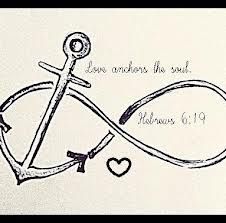 a cross and an anchor with the words love anchors the soul