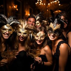 a group of people wearing masks posing for a photo