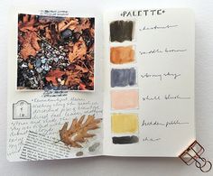 an open page in a book with leaves and other things on it, including ink