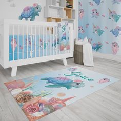 a baby's room with a crib, rug and wallpaper in pastel colors