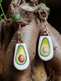 Handmade from scratch, mixing 80% of porcelain with a 20% of earthenware to make them durable and light at the same time. Painted with underglazes and then a touch of luster to get the gold. Fish hook Hypoallergenic and Nickel Free. Avocado Earrings, Gold Fish, Fish Hook, Earthenware, From Scratch, Jewelry Earrings Dangle, Avocado, Etsy Earrings, Dangle Drop Earrings