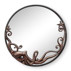 an octopus is sitting in the middle of a circular mirror with intricate designs on it