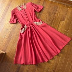 1940s  coral puff sleeve shirt dress  ↓ Measurements↓  Bust:  35 - 38" Waist:  28 - 28.5"  Hips:  free"  Length:  43"   Closure: Front Buttons side metal zipper Pockets: Yes Condition:  a few scuff marks, some very faint fade on bodice  Material:  rayon blend   Label:  sue sannah sweet as a song Item Number:  TPF-11,076 Womens Outfit, Puff Sleeve Shirt, 1940s Dresses, Dress Shirt Sleeves, Dress Measurements, Metal Zipper, A Song, Dress Clothes For Women, Item Number