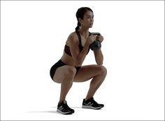 a woman squatting while holding a kettle