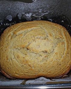 a loaf of bread sitting in a black container