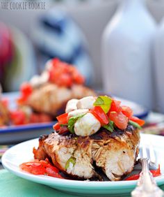 some food is sitting on a white plate