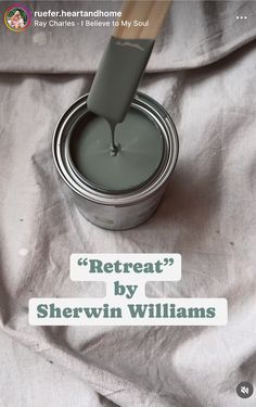 a paint can with a brush in it and the words, rereat? by sherwin williams