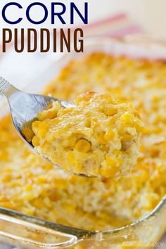 a spoon full of macaroni and cheese being lifted from a casserole dish