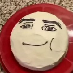 a cake with a face drawn on it