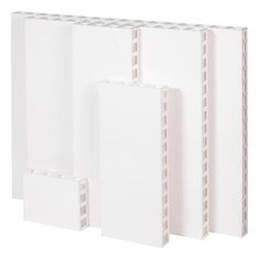 three white folders stacked on top of each other in front of a white background